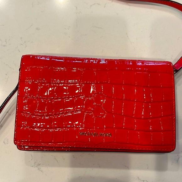 MICHAEL Michael Kors Handbags - Like new Michael Kors Flap XBody bag. Used 2X